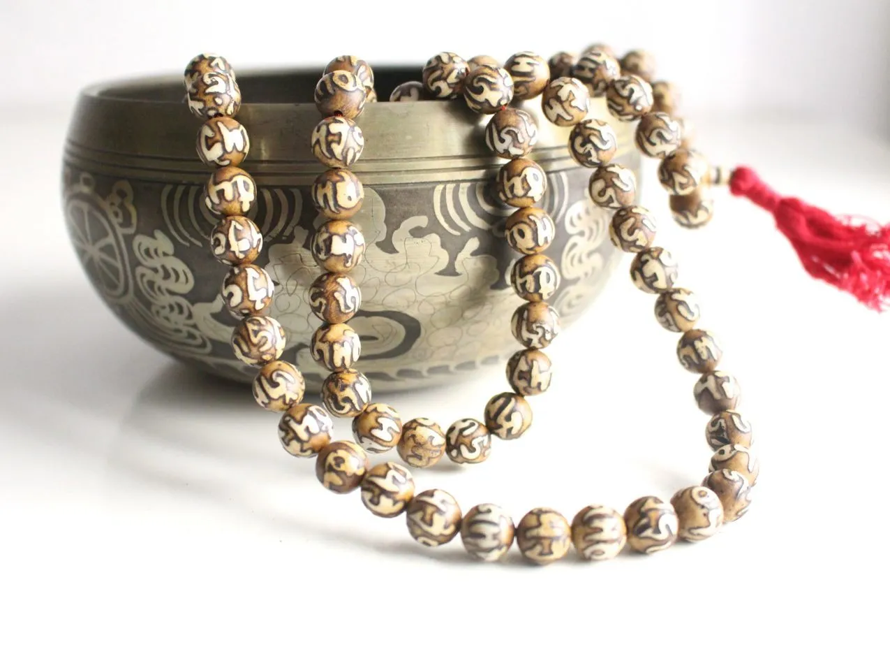 Buddhist Om Mani Etched Conch Mala-10mm