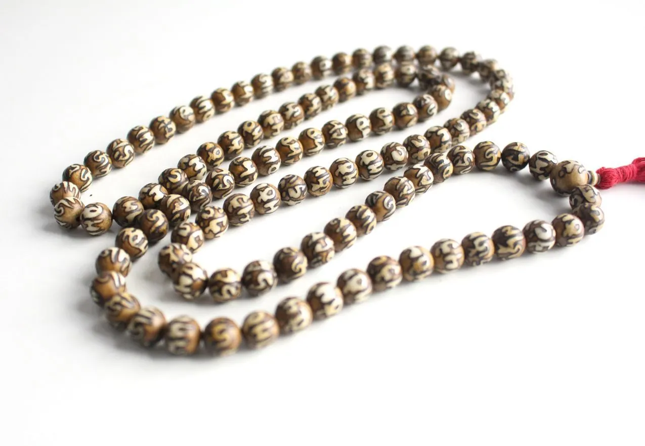Buddhist Om Mani Etched Conch Mala-10mm