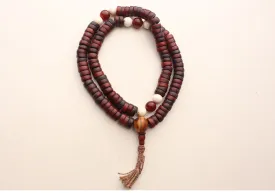 Disk Shaped Yak Bone Japa Mala with White Conch and Carmelian Beads Counter