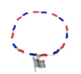 USA patriotic stretch anklet with flag charm. Red, white. and, blue elastic stretch anklet with silver beads and charm.
